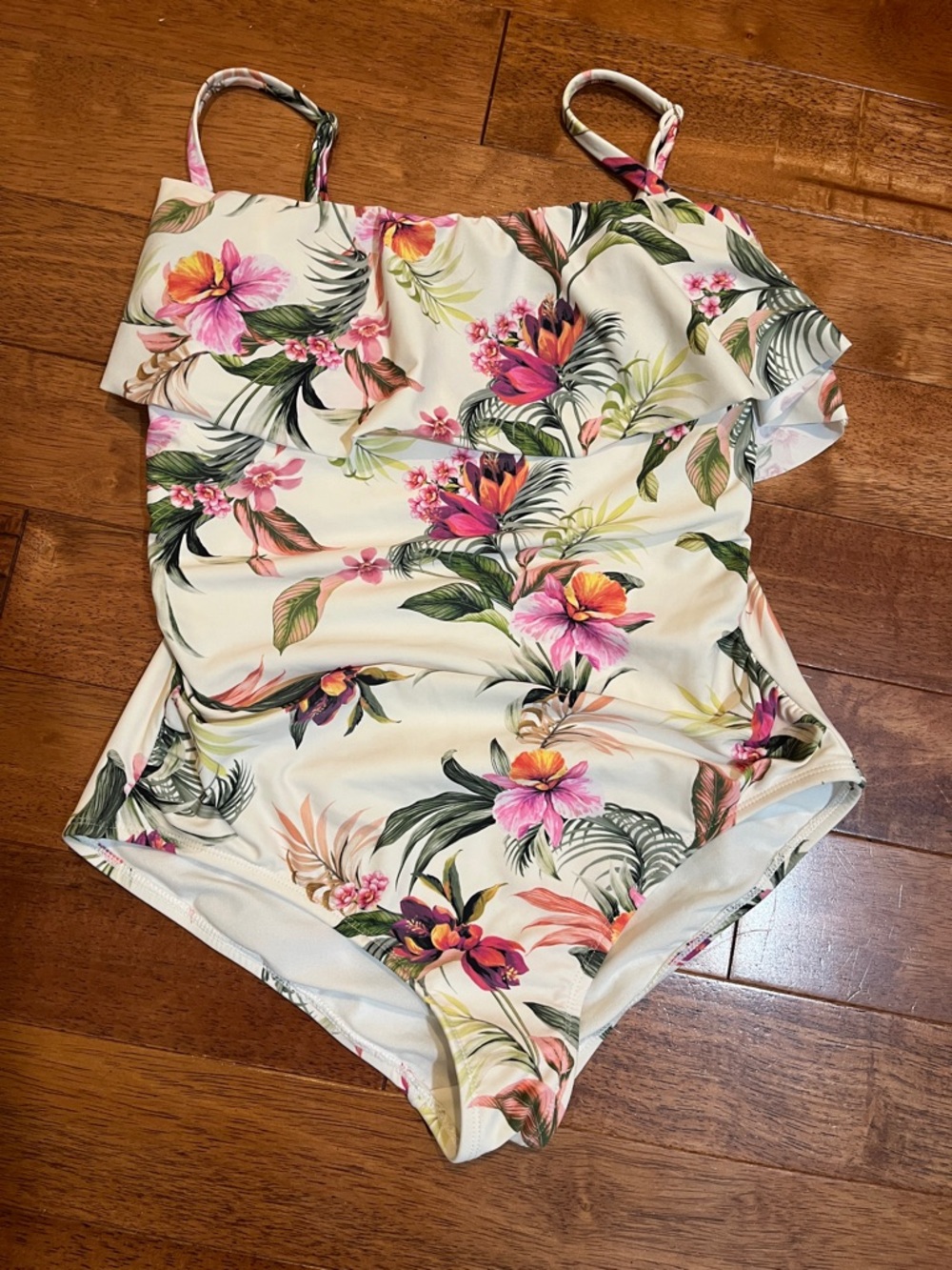 Kona Sol One Piece Bathing suit with tropical floral pattern. Adjustable straps.